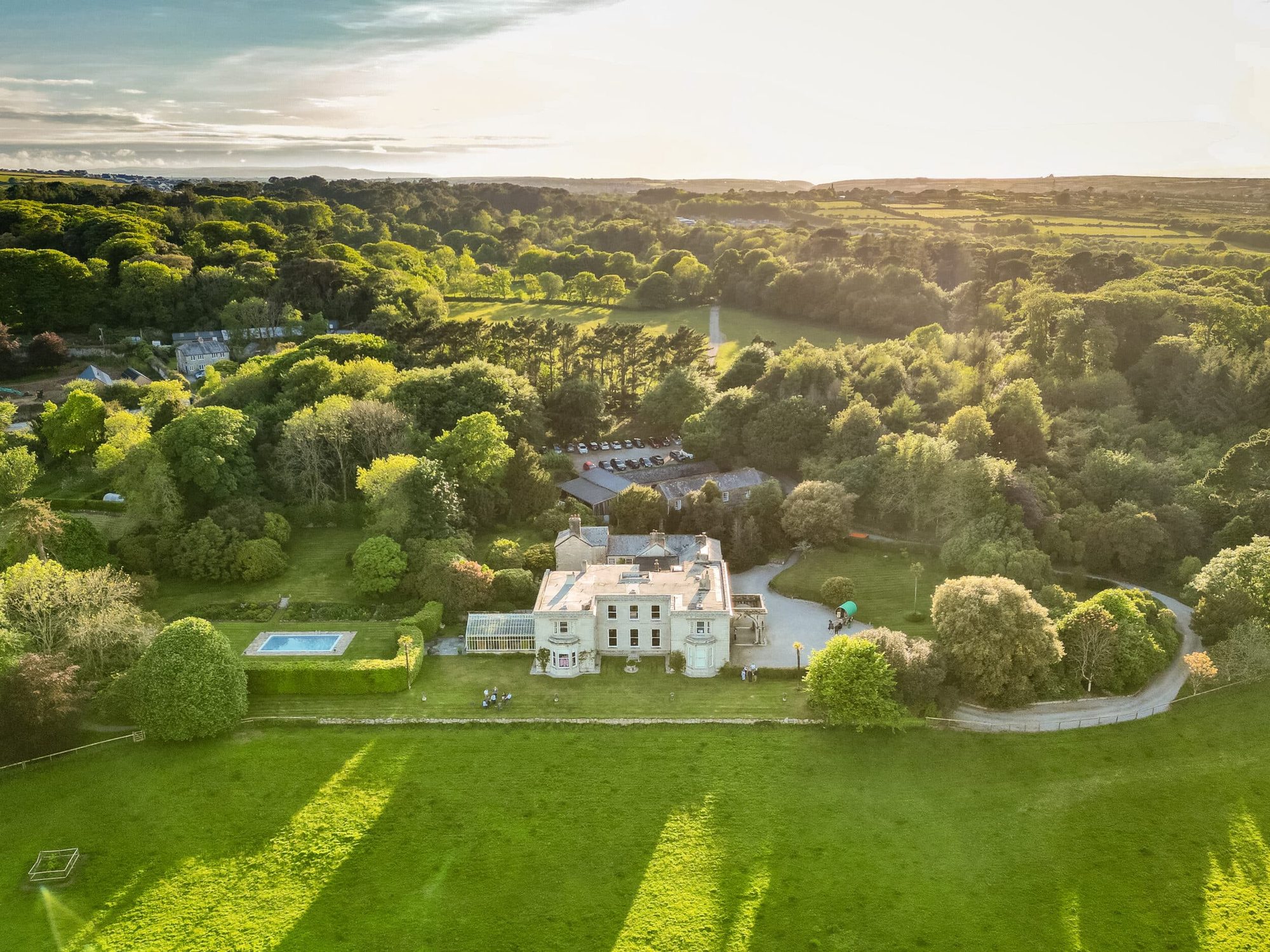 Scorrier House and Estate in Cornwall at golden hour, the first RemindHer Live venue