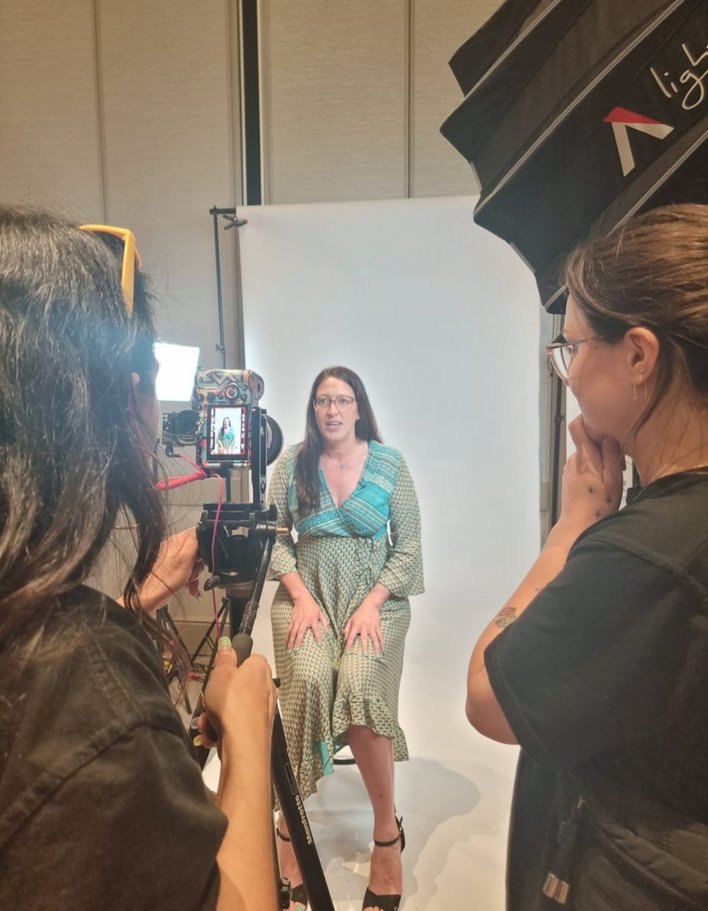 Jay-anne being filmed on set, speaking directly to camera